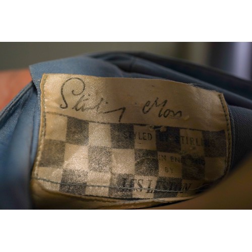 202 - Motor racing interest - Sir Stirling Moss (1929-2020), an original Les Leston blue racing suit with ... 