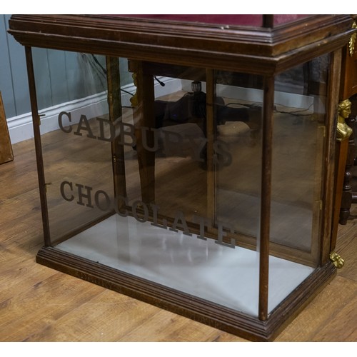 694 - A late Victorian/ early 20th Century mahogany framed shop display cabinet for CADBURY'S CHOCOLATE wi... 