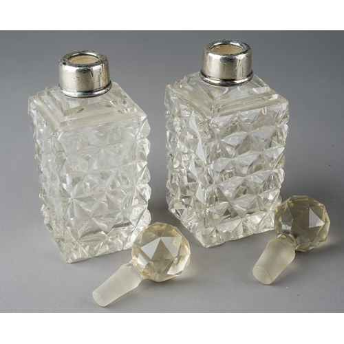 13 - A pair of cut glass silver mounted dressing table scent bottles; silver handled button hook; manicur... 