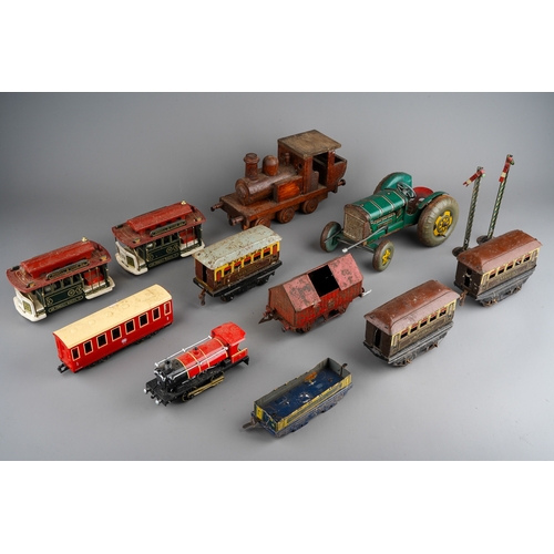 33 - A collection of English vintage tin plate toys to include: Mettoy type clockwork tractor (mechanism ... 