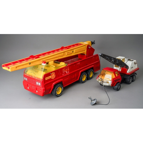 36 - Tonka Toys.  A large scale 1980's fire truck, missing side ladders and a red/white recovery crane 19... 