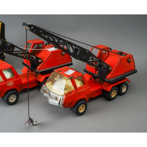 37 - Tonka Toys.  A 1970's Mighty Loader digger with two red recovery cranes.  Large scale (2)