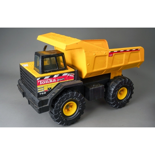 40 - Tonka Toys.  A Mighty dump truck.  Mighty 768 transfer with a plastic bodied fire engine.  Large Sca... 