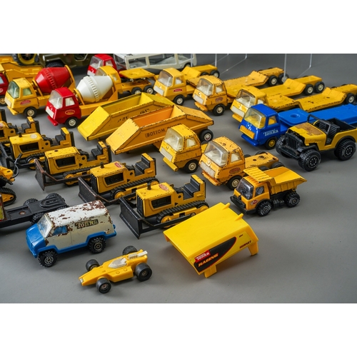 49 - Tonka Toys.  Two trays of play worn vehicles to include 6 small scale bulldozers and 8 articulated t... 