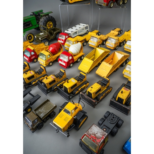 49 - Tonka Toys.  Two trays of play worn vehicles to include 6 small scale bulldozers and 8 articulated t... 