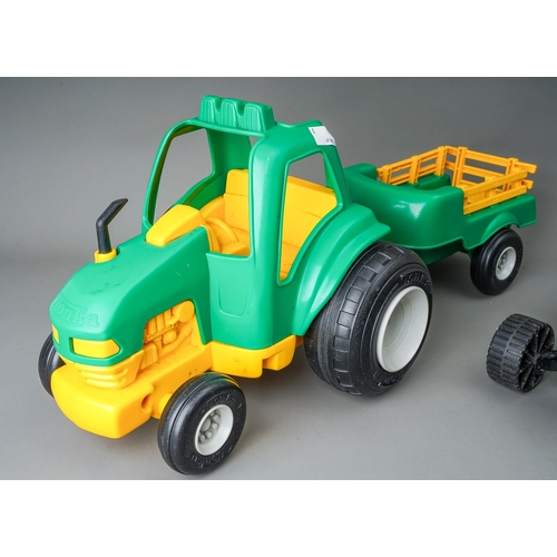 50 - Tonka Toys.  A green large scale tractor, together with a green/yellow plastic tractor and trailer (... 