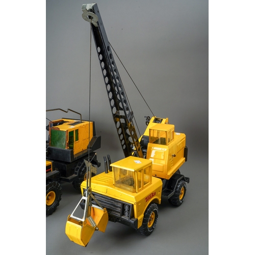 53 - Tonka Toys. A pair of large scale crane trucks of different types (surface rust to one) (2)