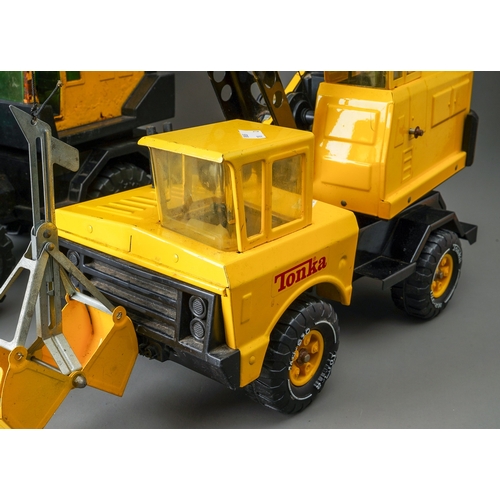 53 - Tonka Toys. A pair of large scale crane trucks of different types (surface rust to one) (2)