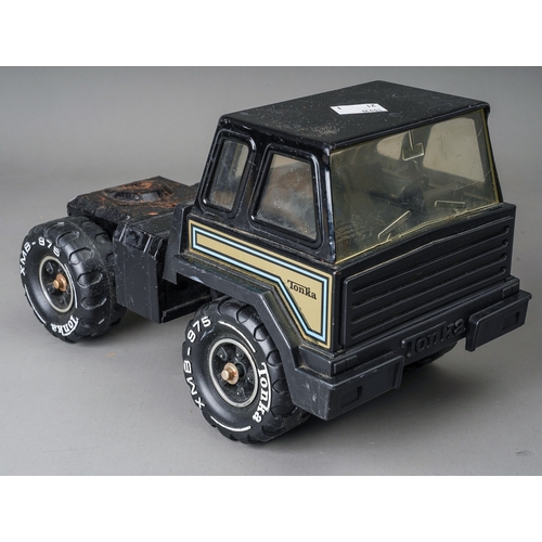 56 - Tonka Toys.  A large scale car cruiser articulated lorry and trailer.  Black, slight surface rust (1... 