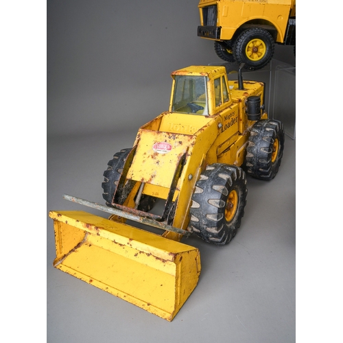 59 - Tonka Toys.  Four large scale vehicles - car carrier, loader, 4 wheel crane, dump truck, all requiri... 