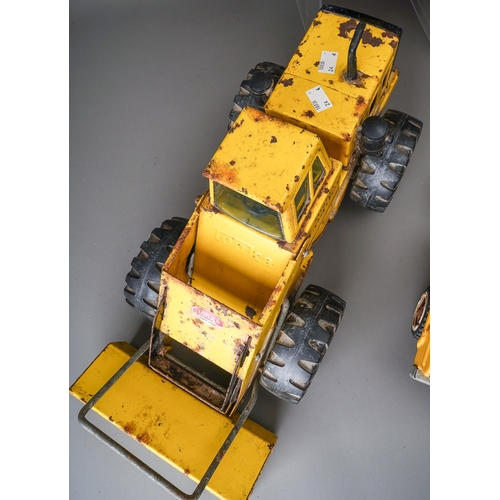 59 - Tonka Toys.  Four large scale vehicles - car carrier, loader, 4 wheel crane, dump truck, all requiri... 