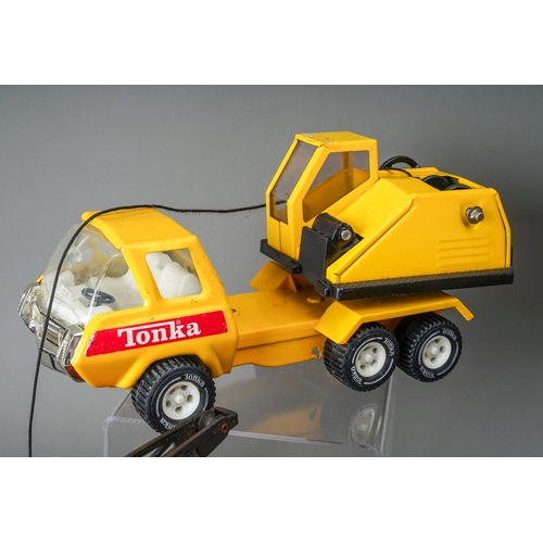 62 - Tonka Toys.  A collection of medium scale 6 wheel crane trucks, 4 red and 2 yellow AF (6)