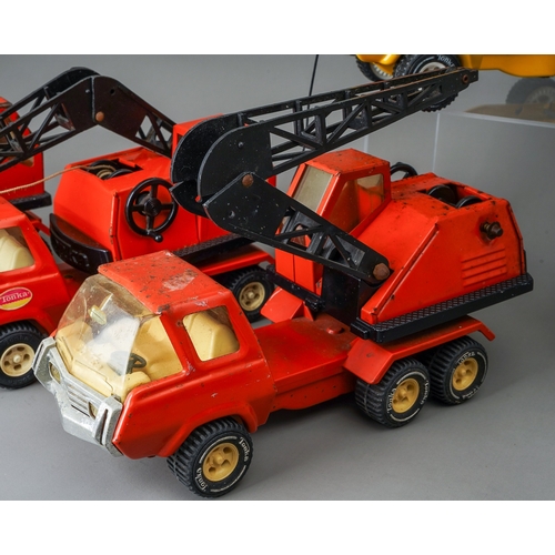 62 - Tonka Toys.  A collection of medium scale 6 wheel crane trucks, 4 red and 2 yellow AF (6)