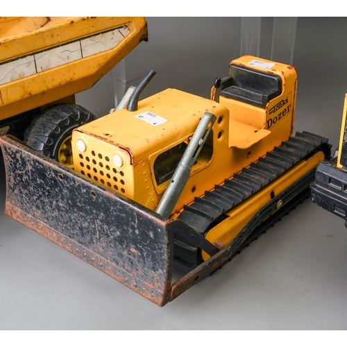 74 - Tonka Toys.  A collection of 4 large scale vehicles, 2 x dumper truck, 4 wheel crane truck and track... 