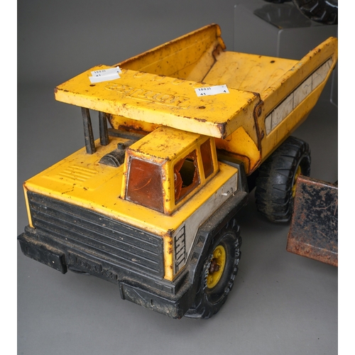 74 - Tonka Toys.  A collection of 4 large scale vehicles, 2 x dumper truck, 4 wheel crane truck and track... 