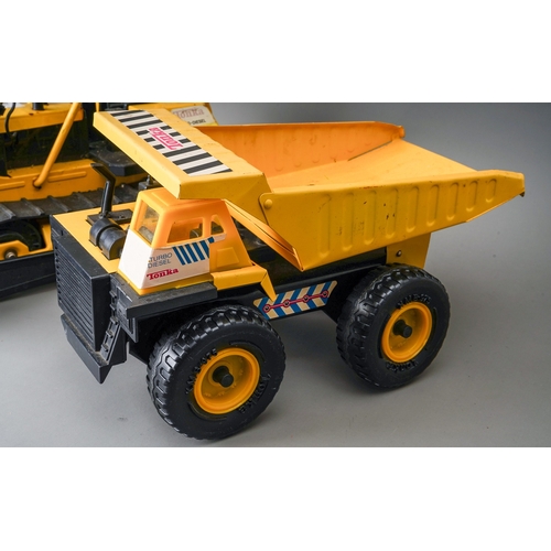 75 - Tonka Toys.  A large scale caterpillar tractor together with a dumper tipper truck (2)