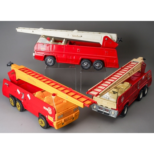 76 - Tonka Toys.  Large scale 6 wheel fire engine, 3 different variations of trim (3)