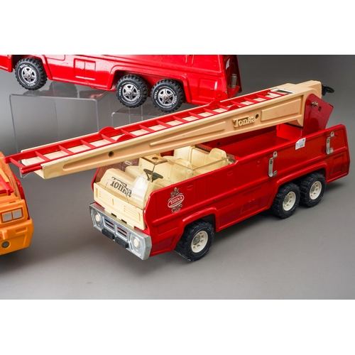 76 - Tonka Toys.  Large scale 6 wheel fire engine, 3 different variations of trim (3)