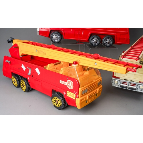 76 - Tonka Toys.  Large scale 6 wheel fire engine, 3 different variations of trim (3)