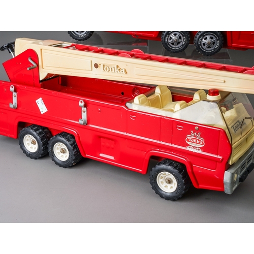 76 - Tonka Toys.  Large scale 6 wheel fire engine, 3 different variations of trim (3)