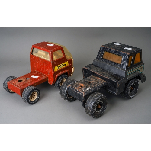 84 - Tonka Toys.  Two large scale car transporter and tractor units in different styles for restoration (... 