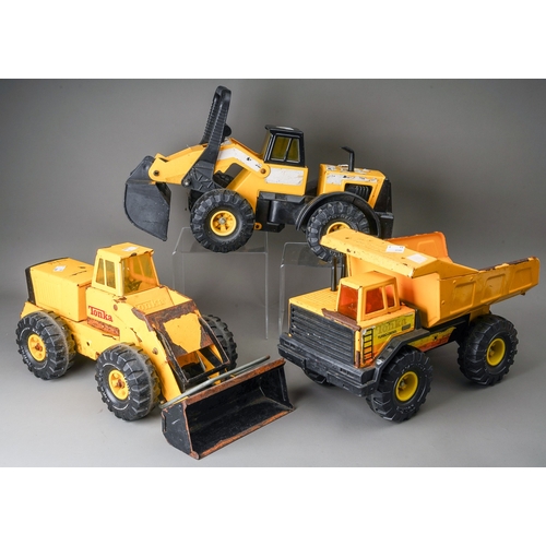 85 - Tonka Toys.  Two large scale loaders of different designs and a dumper truck.  Paintwork needs resto... 