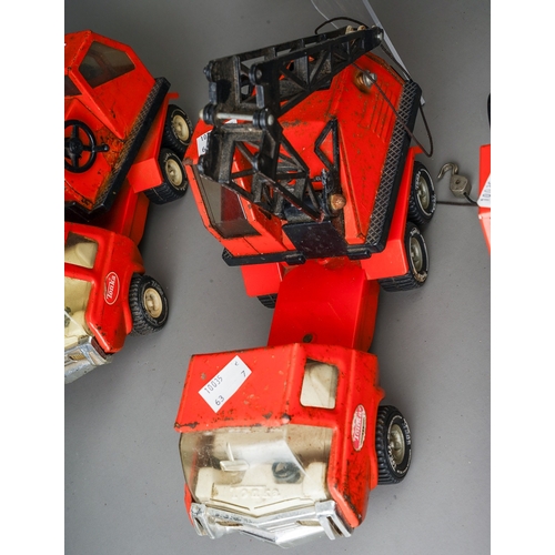 95 - Tonka Toys.  7 medium scale 6 wheel crane trucks in red, variable condition, some damaged (7)