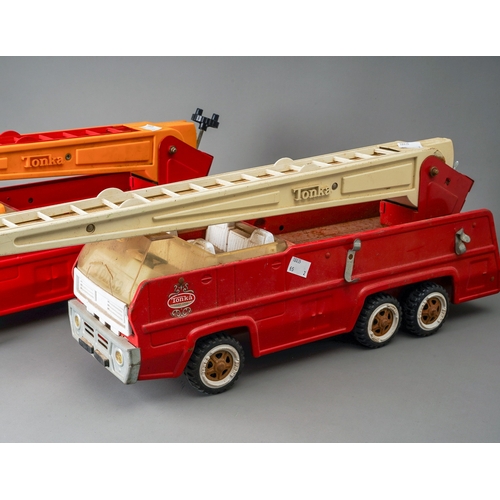 97 - Tonka Toys.  A pair of large scale 6 wheel fire engines, different colour trims (2)