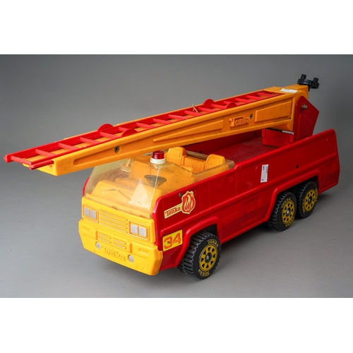 97 - Tonka Toys.  A pair of large scale 6 wheel fire engines, different colour trims (2)