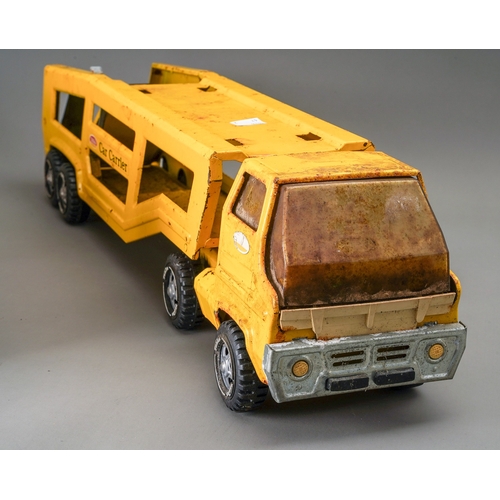 99 - Tonka Toys.  2 large scale articulated car transporters in yellow for restoration (2)