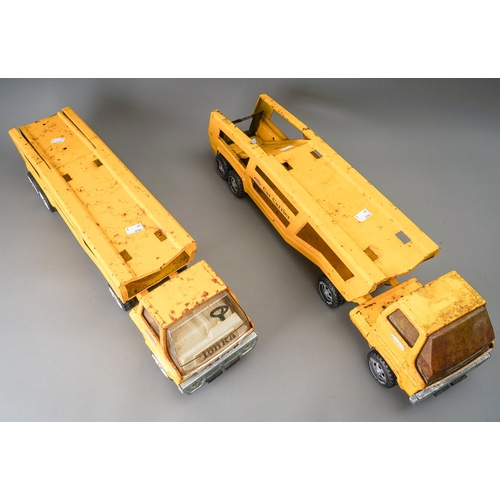 99 - Tonka Toys.  2 large scale articulated car transporters in yellow for restoration (2)