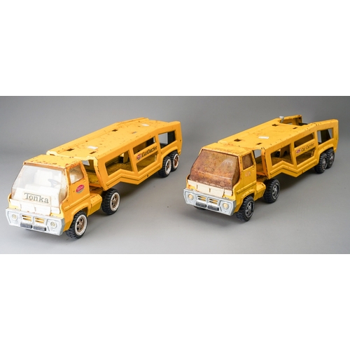 99 - Tonka Toys.  2 large scale articulated car transporters in yellow for restoration (2)