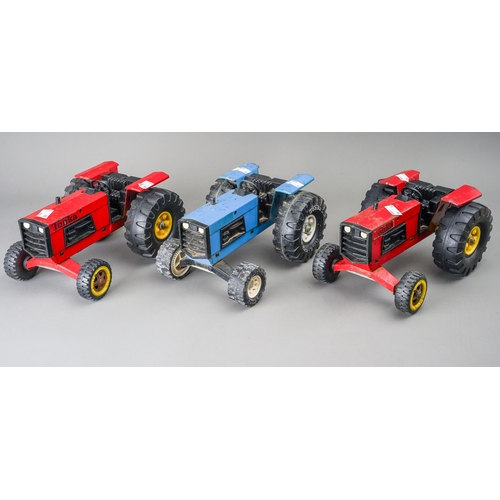 110 - Tonka Toys.  3 large scale tractors 2 red, 1 blue (3)