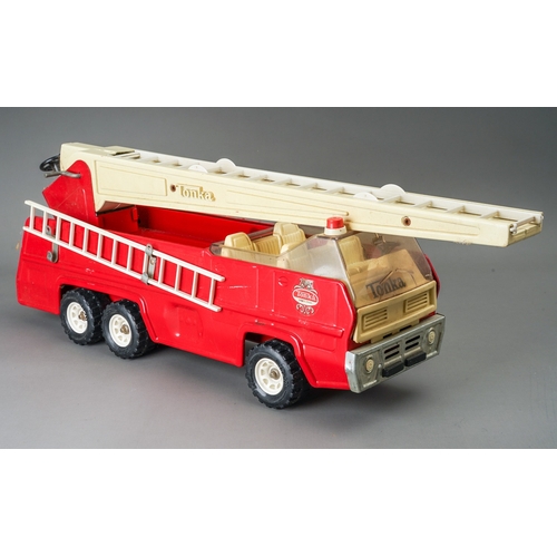 119 - Tonka Toys.  A boxed No. 2960 6 wheel fire engine in good condition.  Box has tape residue and gener... 