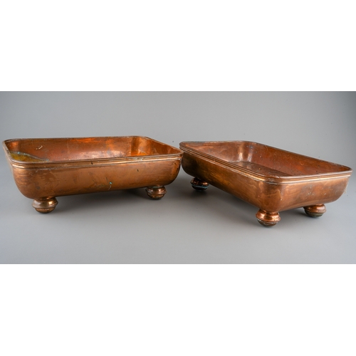 137 - A pair of early 20th Century rectangular copper warming pans / entree dishes, with pierced grilles o... 