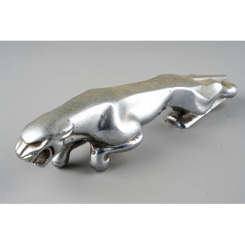 138 - A vintage chrome plated leaping Jaguar car mascot, unmounted, approx 18cm long, numbered to undersid... 