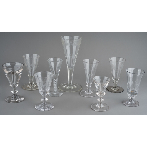 179 - A collection of clear glass drinking glasses probably 19th Century and later, all with trumpet shape... 