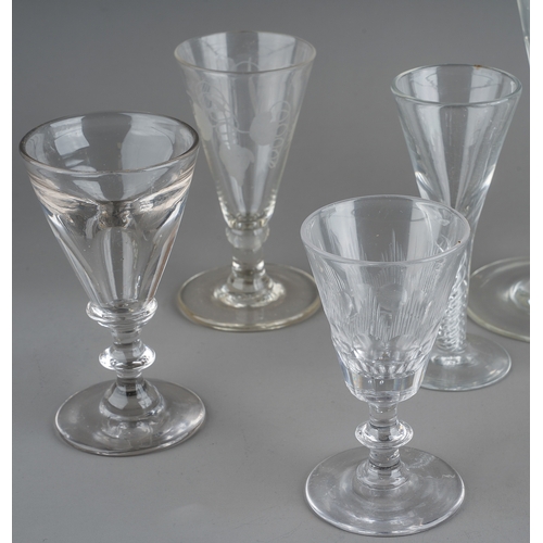 179 - A collection of clear glass drinking glasses probably 19th Century and later, all with trumpet shape... 