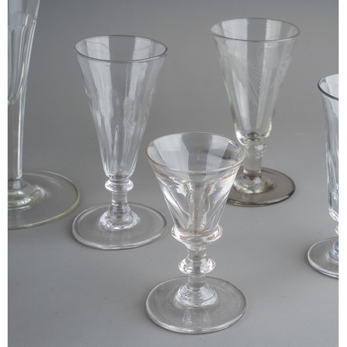 179 - A collection of clear glass drinking glasses probably 19th Century and later, all with trumpet shape... 