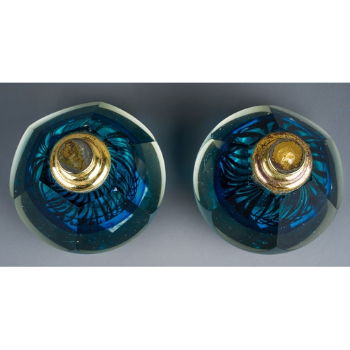 181 - A pair of vintage gilt mounted glass paperweights probably Murano, facet cut trapezoid with interior... 