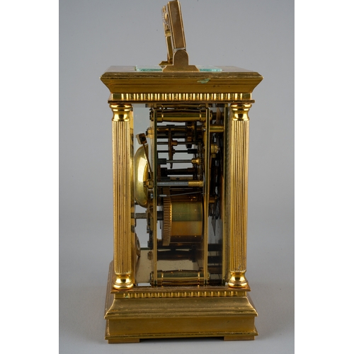 231 - An ormolu mounted four glass carriage clock, circular enamel dial with Roman Numerals and numbered D... 