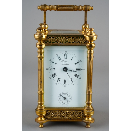 232 - A French gilt brass carriage clock, white dial with Roman numerals and Arabic dial, with subsidiary ... 