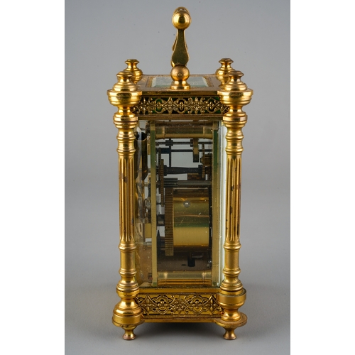 232 - A French gilt brass carriage clock, white dial with Roman numerals and Arabic dial, with subsidiary ... 