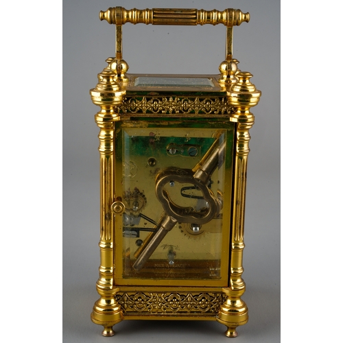 232 - A French gilt brass carriage clock, white dial with Roman numerals and Arabic dial, with subsidiary ... 