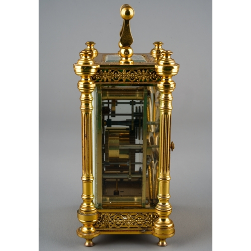 232 - A French gilt brass carriage clock, white dial with Roman numerals and Arabic dial, with subsidiary ... 