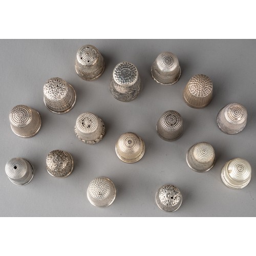 15 - A collection of 16 silver thimbles, various sizes and dates