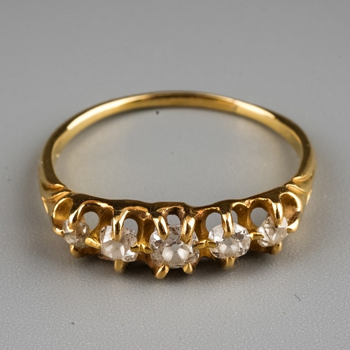 9 - A yellow gold and diamond five-stone ring, set with graduated old-cut diamonds, size Q1/2, unmarked ... 