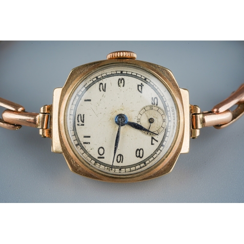 76 - A 9ct yellow gold wristwatch, circular dial with Arabic numerals, expanding strap, total gross weigh... 