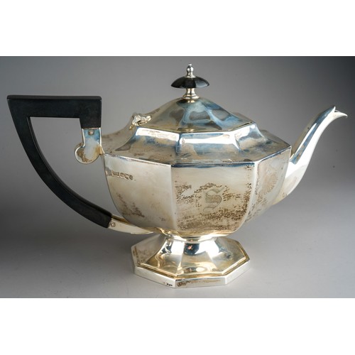 203 - A George VI silver four piece tea service comprising teapot, milk jug, sugar bowl and hot water pot,... 