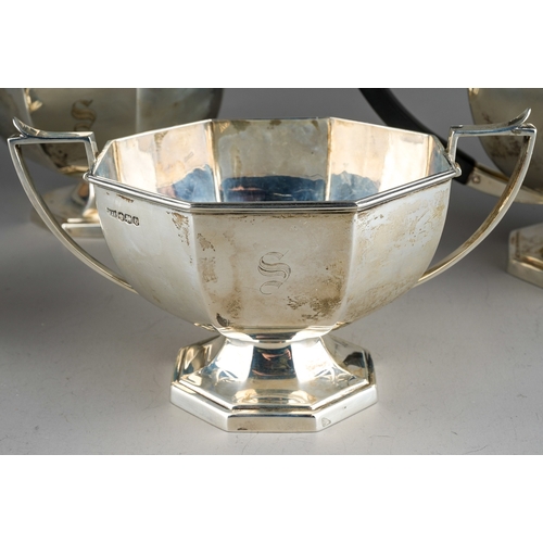 203 - A George VI silver four piece tea service comprising teapot, milk jug, sugar bowl and hot water pot,... 